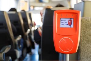 orange-ticket-validation-machine-modern-public-transport-bus_81262-1444
